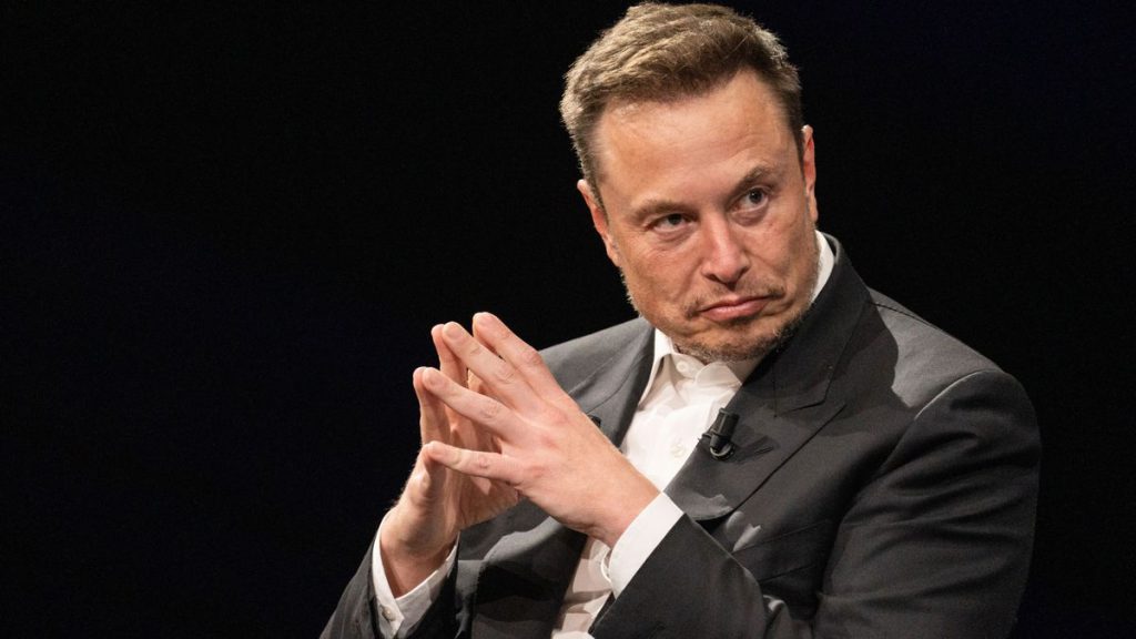 Elon Musk steepling his hands and looking sombre.
