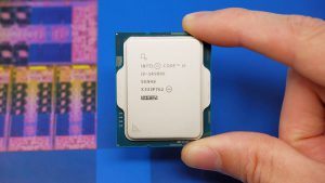 Intel Core i9 14900K CPU, held between a person